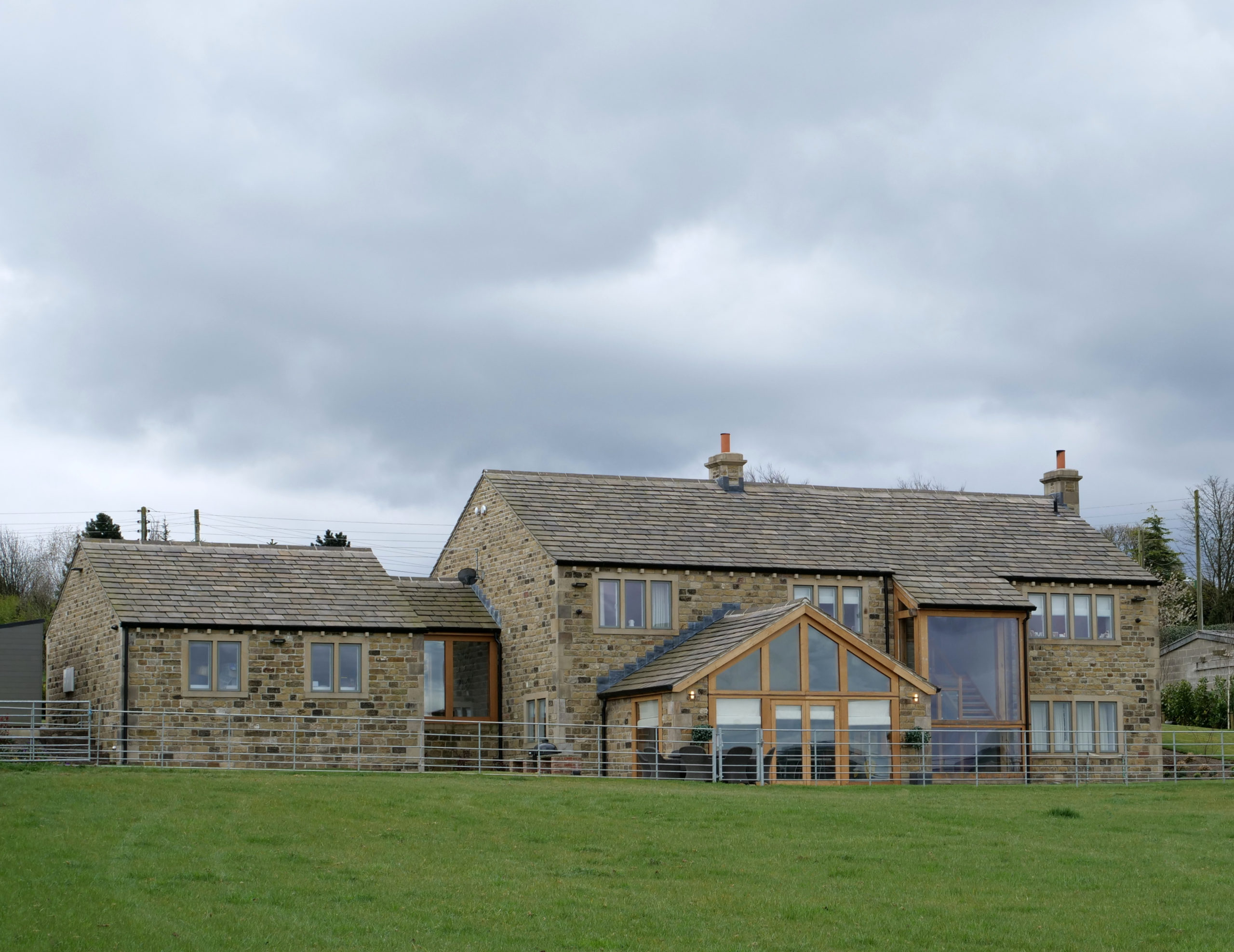 Large,Modern,Two,Story,Stone,Built,House,With,Single,Height