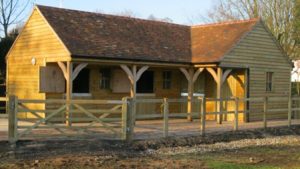 Tiled oak framed stables - artist impression